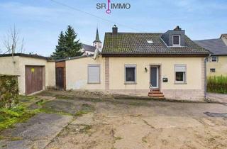 Einfamilienhaus kaufen in 54668 Ferschweiler, Ferschweiler - Gemütliches Wohnhaus mit Wintergarten in ruhiger Lage