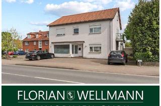 Haus kaufen in 28832 Achim, Achim - Achim | Vermietetes Wohn und Geschäftshaus mit freier Gewerbeeinheit und Baupotenzial im Hinterland