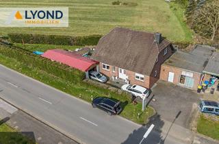 Einfamilienhaus kaufen in 46509 Xanten, Xanten / Vynen - Attraktives Einfamilienhaus mit Gewerbefläche und unverbautem Blick im idyllischen Xanten-Vynen