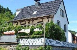 Einfamilienhaus kaufen in Martinstraße 2, 54340 Ensch, Ensch - Familienfreundliches Haus mit Garten, 3 Wohneinheiten, Garagen und Keller Weitblick