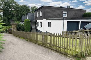 Haus kaufen in 42929 Wermelskirchen, Wermelskirchen - Vermietetes Zweifamilienhaus mit großem Garten in begehrter und ruhiger Lage