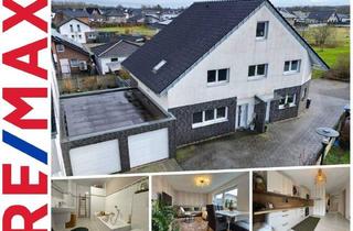 Mehrfamilienhaus kaufen in 41836 Hückelhoven, Hueckelhoven - Rentable Investmentmöglichkeit -Attraktives Dreifamilienhaus in ruhiger, zentrumsnaher Wohnlage!