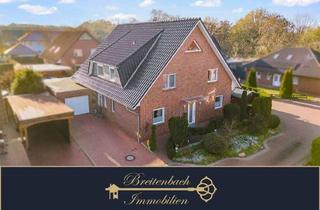 Haus kaufen in 27793 Wildeshausen, Wildeshausen - Zweifamilienhaus mit Komfortplus - Kamin, Garten, Terrasse und mehr