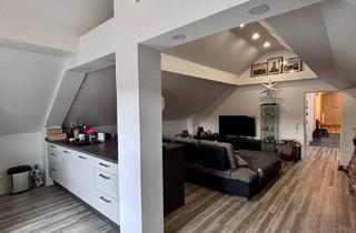 Wohnung kaufen in Welleröder Straße 39, 34253 Lohfelden, Lohfelden / Vollmarshausen - Exklusives Wohnen im Dachgeschoss - Kunstvolle Architektur trifft auf beeindruckende Raumhöhe