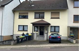 Haus kaufen in 66346 Püttlingen, Püttlingen - Vermietetes 2-Familienhaus in zentraler Lage von Püttlingen zu verkaufen