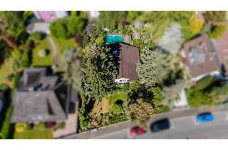 Einfamilienhaus kaufen in 55246 Mainz-Kostheim, Mainz-Kostheim - Haus im Bungalow-Stil auf großem Grundstück mit traumhaftem Garten, altem Baumbestand und Pool