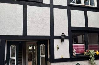 Haus kaufen in Holzweg 21A, 53424 Remagen, Remagen - Charmantes Fachwerkhaus mit Einliegerwohnung und Sonnenterrasse in Remagen-Oberwinter