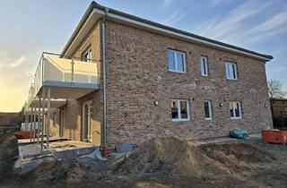 Wohnung kaufen in Hauweg 31A, 49163 Bohmte, Bohmte - Obergeschoss-Eigentumswohnung nach neustem Energiestandard mit Balkon