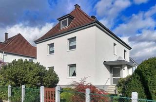 Haus kaufen in 33647 Brackwede, Zweifamilienhaus in ruhiger Lage von Bielefeld-Brackwede