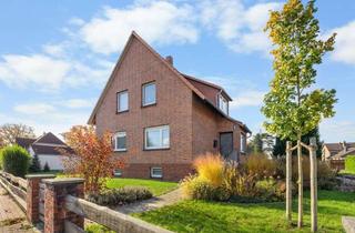 Einfamilienhaus kaufen in 30826 Garbsen, Frielingen: Charmantes Einfamilienhaus mit großem Garten und Garagen