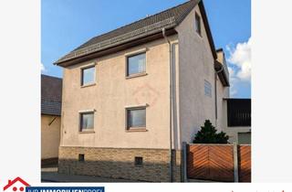 Einfamilienhaus kaufen in 35452 Heuchelheim, Einfamilienhaus mit Außenküche, Partyraum und viel Bonus-Fläche in Heuchelheim!