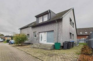 Haus kaufen in 59077 Pelkum, Familienfreundlich und flexibel: Zweifamilienhaus mit wohnraumähnlicher Kellereinheit