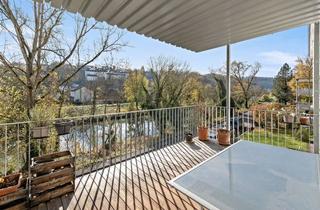 Wohnung kaufen in 72108 Rottenburg, Besser Wohnen in begehrter Neckarlage von Rottenburg mit grossem Balkon, Eichenparkett und Carport