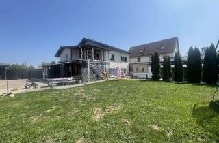 Haus kaufen in 61231 Bad Nauheim, Zweifamilienhaus mit ausgebautem Untergeschoss, Garage und großem Garten !