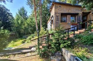 Haus kaufen in Erlenbacher Steig 2, 12559 Berlin, Berlin - Grundstück mit Kleinhaus in idyllischer Lage: 200 m zum See