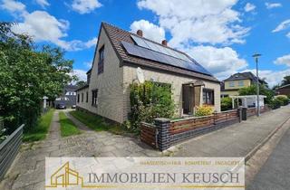 Einfamilienhaus kaufen in 28832 Achim, Achim - Großes 2FH mit Kamin, Sonnenterrasse, ruhige & zentrale Lage in Achim mit Vollkeller, Garagen & PV