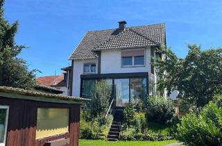 Haus kaufen in 34379 Calden, Calden - Charmantes Zweifamilienhaus in Calden-Obermeiser: großes Grundstück-Tierhaltung möglich