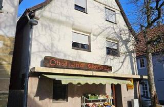 Mehrfamilienhaus kaufen in Mittlere Gasse 1, 71254 Ditzingen, Ditzingen - Mehrfamilienhaus mit zwei Wohnungen und Laden