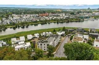 Wohnung kaufen in 44269 Dortmund, Dortmund - Ruheoase am PHOENIX-See: Hochwertige Erdgeschosswohnung mit Terrasse und Garten