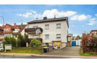 Einfamilienhaus kaufen in 34270 Schauenburg, Schauenburg - Einfamilienhaus mit zwei Wohnbereichen, großer Garage und BüroGewerbefläche