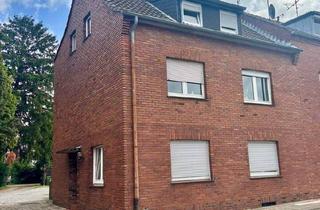 Haus kaufen in 52134 Herzogenrath, Herzogenrath - Reiheneckhaus - mit großem Garten - 899 m² Grundstück - zwei Garagen - in guter Lage von Kohlscheid (Herzogenrath) - derzeit an zwei Mieter vermietet