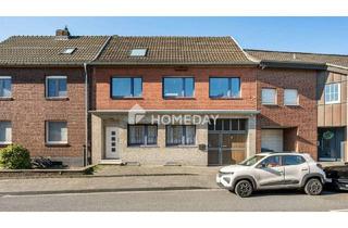 Haus kaufen in 41836 Hückelhoven, Hückelhoven - Raum für die ganze Familie - Charmantes Zweifamilienhaus mit Gartenidylle