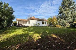 Haus kaufen in 63225 Langen, Langen - Für die Familie: Modernisierter Bungalow mit Gartenparadies in LangenOberlinden