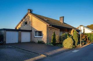 Einfamilienhaus kaufen in 33803 Steinhagen, Steinhagen - Exklusives Wohnen am Fuße des Teutoburger Walds: Großzügiges Einfamilienhaus mit umfangreicher Wohn- und Nutzfläche in Toplage von Steinhagen