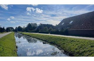 Wohnung kaufen in 26629 Großefehn, Großefehn - Exklusive Eigentumswohnung im ostfriesischen Gulfhof