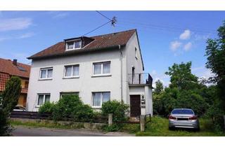 Haus kaufen in 55444 Schweppenhausen, Schweppenhausen - Gepflegtes Zweifamilienhaus plus zusätzliches Bau-oder Gartengrundstück im Mischbaugebiet