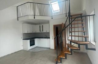 Wohnung kaufen in 86381 Krumbach, Krumbach (Schwaben) - Galeriewohnung mit Balkon & Tiefgaragenstellplatz - Zentrale Lage