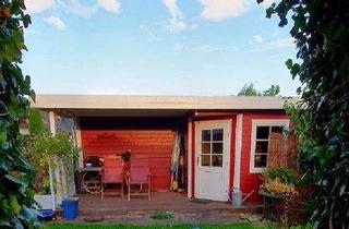 Haus kaufen in 34225 Baunatal, Baunatal - Komfort Bungalow in Baunatal mit viel Nebengelass