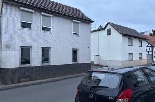 Mehrfamilienhaus kaufen in 53129 Bonn, Bonn - 2 Wohnhäuser und 13 Garagen auf 1061 m² Grundstück, ideal für den Neubau von Reihenhäuser oder ein Mehrfamilienhaus geeignet