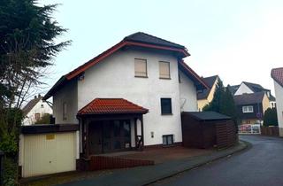 Einfamilienhaus kaufen in 35633 Lahnau, Lahnau - Provisionsfrei: Freistehendes Einfamilienhaus mit Einliegerwohnung und Garten