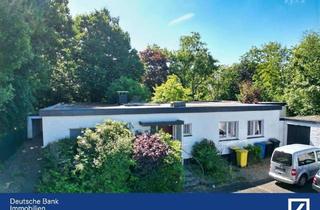Haus kaufen in 40670 Meerbusch, Meerbusch - Charmanter Bungalow in Toplage von Meerbusch - viel Raum für Ihre
