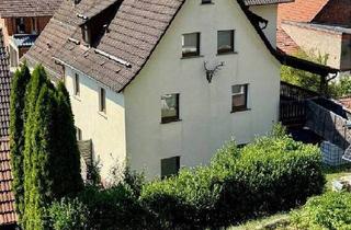 Haus kaufen in 63869 Heigenbrücken, Heigenbrücken - Mit Potential! Zweifamilienhaus mit Doppelcarport und Gartenhaus