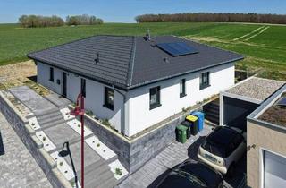 Haus kaufen in 56288 Braunshorn, Braunshorn - Eleganter Winkel-Bungalow in idyllischer Lage!