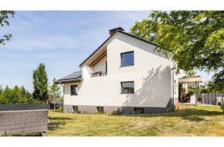 Einfamilienhaus kaufen in 65597 Hünfelden, Hünfelden - Modernisiertes Einfamilienhaus mit großzügigem Wohnkomfort und nachhaltiger Technik