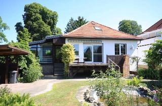 Einfamilienhaus kaufen in 14612 Falkensee, Falkensee - Zur Sanierung: Charmantes Einfamilienhaus mit Wintergarten von 1928 auf sonnigem Südgrundstück