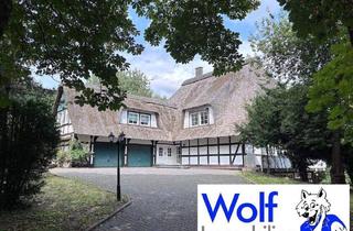 Haus kaufen in 32609 Hüllhorst, Hüllhorst - Modernes Fachwerkhaus mit Reetdach und Wellnessbereich am Südhang des Wiehengebirges