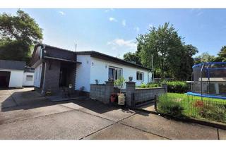 Haus kaufen in 35396 Gießen, Gießen - Saniertes Bungalow mit Nebengebäude - Wohnen in idyllischer Nähe zur Lahn!