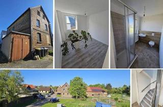 Mehrfamilienhaus kaufen in 06749 Bitterfeld-Wolfen, Muldestausee - Saniertes Altbau-MFH mit 4 Mieteinheiten, Einzelgarage & Keller, Nähe Goitzschesee