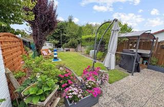 Haus kaufen in 32139 Spenge, Spenge - Wohlfühlhaus mit Gartenidylle - vermietetes Reihenmittelhaus in bester Lage