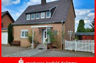 Einfamilienhaus kaufen in 40670 Meerbusch, Meerbusch - Einfamilienhaus mit zwei Garagen