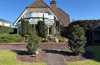 Haus kaufen in 32584 Löhne, Löhne - Geschmackvolles 1-2-Familienhaus mit Wintergarten und Gartenidylle