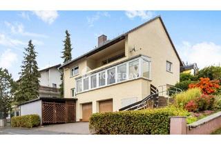 Haus kaufen in 65232 Taunusstein, Taunusstein - Familienidylle im Grünen - vielseitiges Zweifamilienhaus mit Ausbaureserve