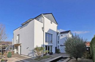 Haus kaufen in 32312 Lübbecke, Lübbecke - Außergewöhnliches Wohnerlebnis in eleganter Architektur