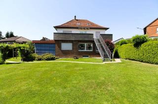 Haus kaufen in 32609 Hüllhorst, Hüllhorst - Wunderschönes Zweifamilienhaus mit TischlerwerkstattGewerbeimmobilie in Schnathorst!