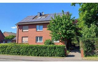 Haus kaufen in 59229 Ahlen, Ahlen - Ahlen Dolberg, ein vielfältig nutzbares 3-Familienhaus mit großem Garten, Vollkeller und 3 Garagen.