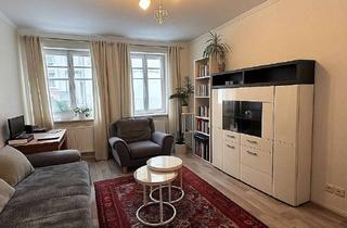 Wohnung kaufen in 90762 Fürth, Altstadt-Idylle trifft Wohngefühl: 4-Zimmer-Wohnung in denkmalgeschütztem Sandsteinhaus